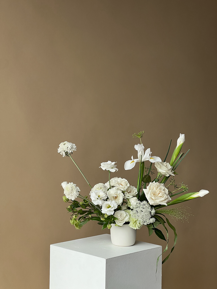 Vancouver Florist - Floral arrangement in a white vase 